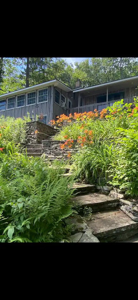 Shehawken Cabin exterior at golden hour